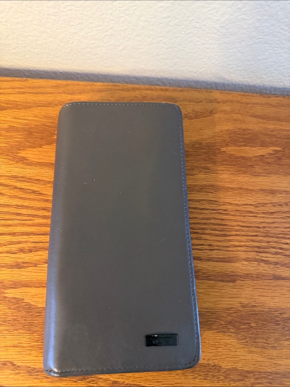 TUMI travel wallet